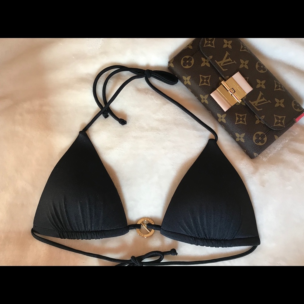 New Victoria Secret swimming top never been used.